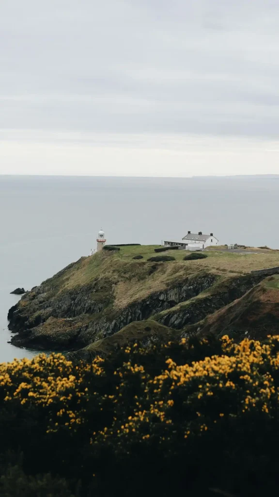 A photo of a lighthouse on an cliff in Ireland Top 10 Fairytale Places