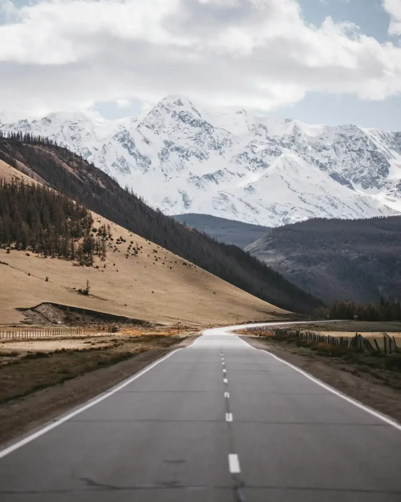 Empty road with mountains in Mongolia Top 10 Fairytale Places